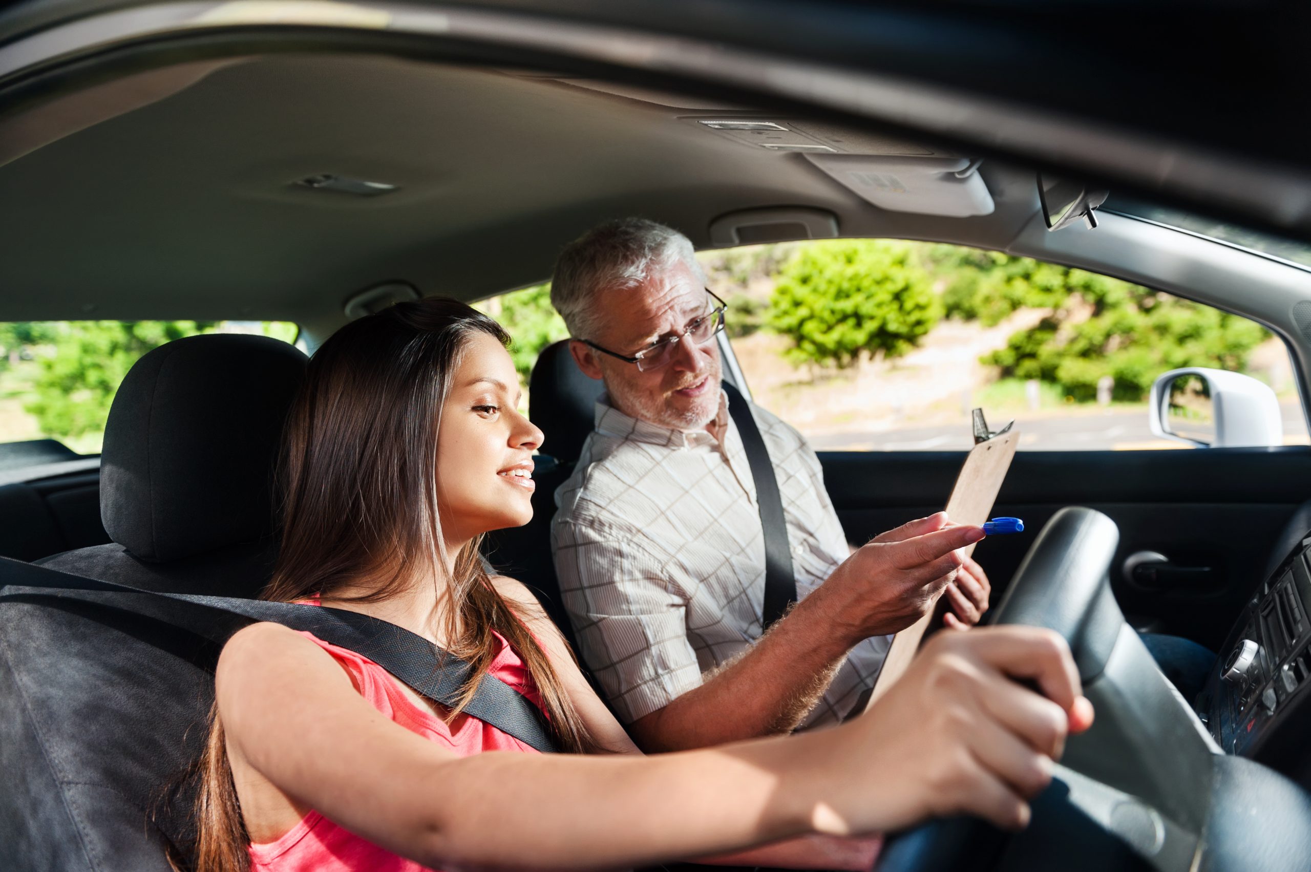 Male Driving Instructor With Student