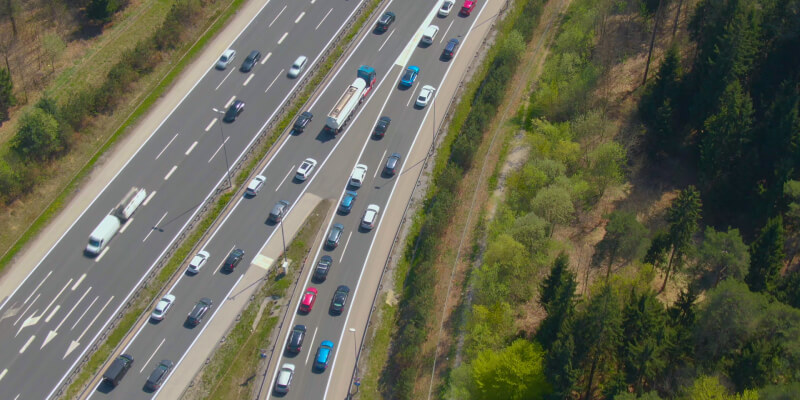 Aerial view of cars merging onto road